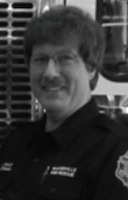 Scott A Holst
